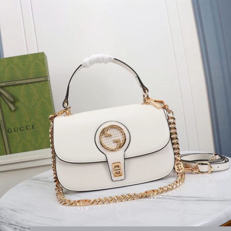 G*u*i top handle bags